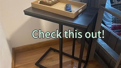 A table that slides in under the couch or bed and can act as a TV tray.