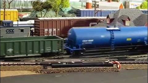 Atlas HO Master Series CSX GP40-2 Pulling a Local Freight on a Small Layout