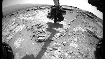 Curiosity Brushes Dust Off Martian Rock | Video