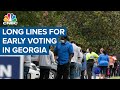 Long lines, high turnout in Georgia with early voting underway