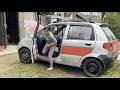 The girl's work is extraordinary because she first cleaned the car and then repaired it