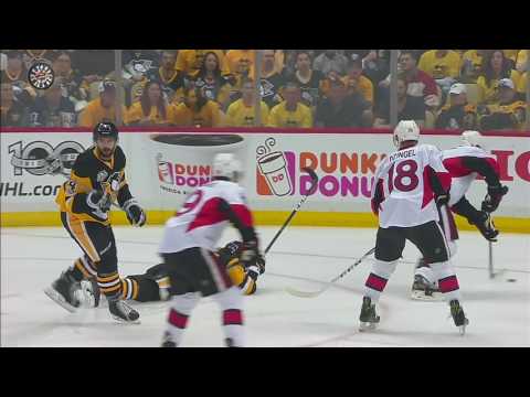 Rust leaves Game 2 after getting crushed by Phaneuf