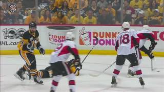 Rust leaves Game 2 after getting crushed by Phaneuf