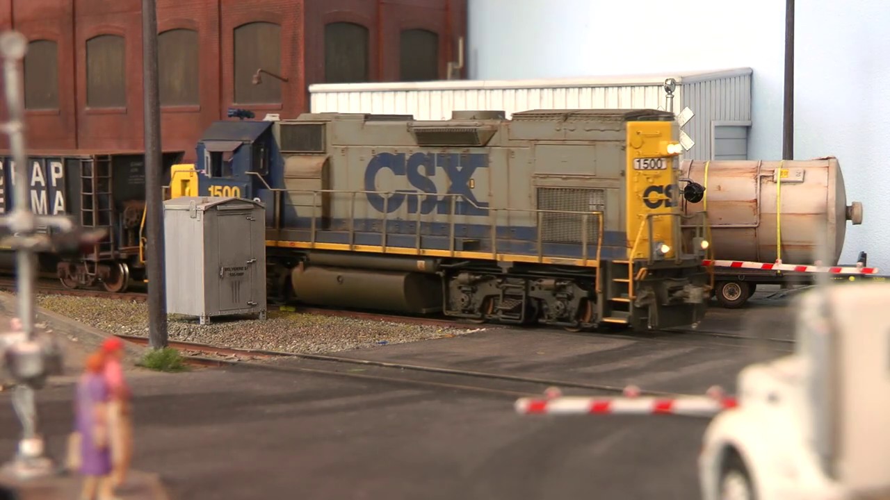 CSX FREIGHT TRAIN RAILROAD CROSSING - YouTube