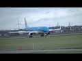 Plane lands at polderbaan schiphol airport