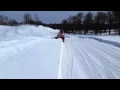 Ventrac snow blowing greens.