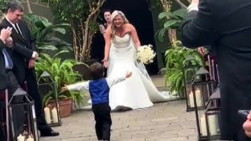 2-Year-Old Ring Bearer Jumps Into Mom’s Arms at Her Wedding