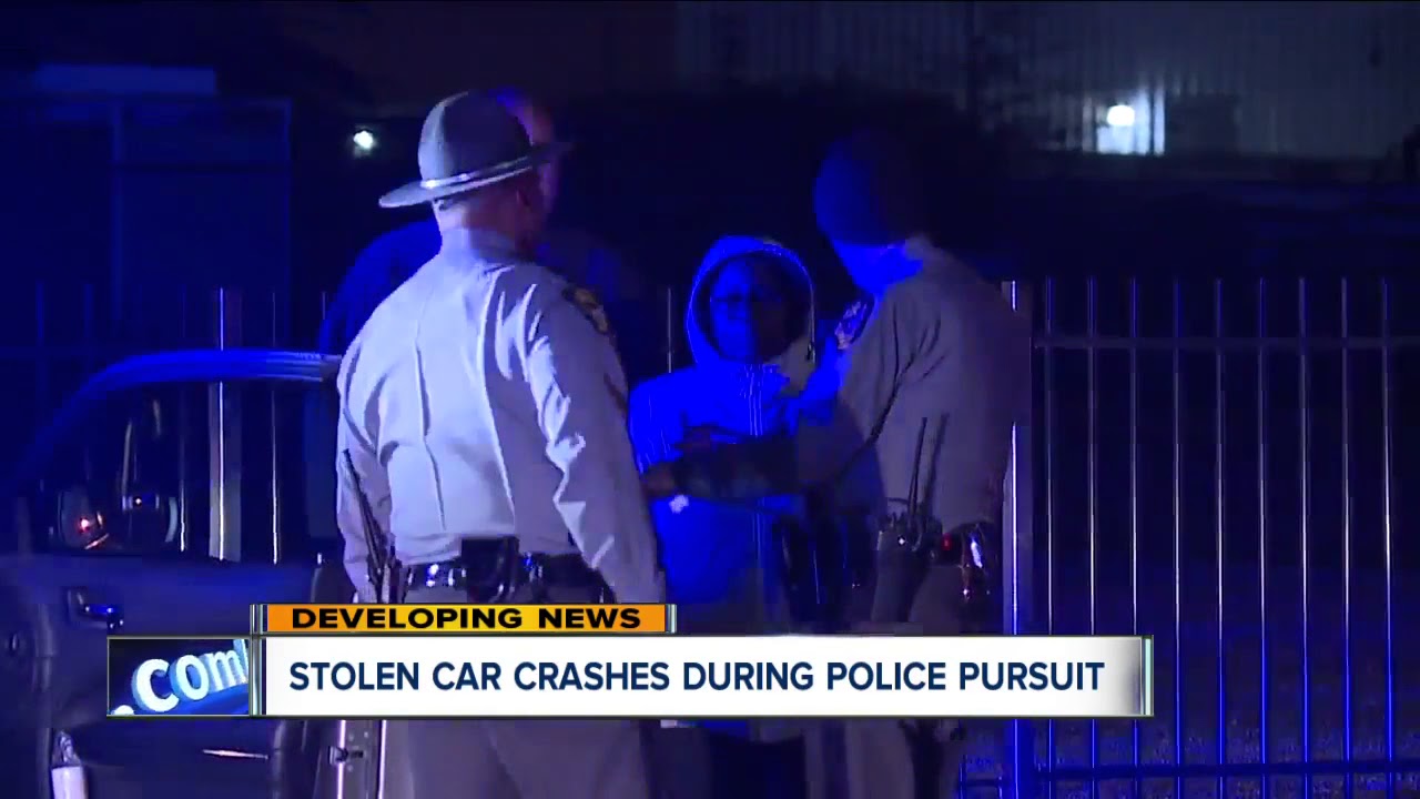 Stolen car crashes during police pursuit - YouTube