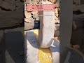 Grinding Grain With a Stone Roller