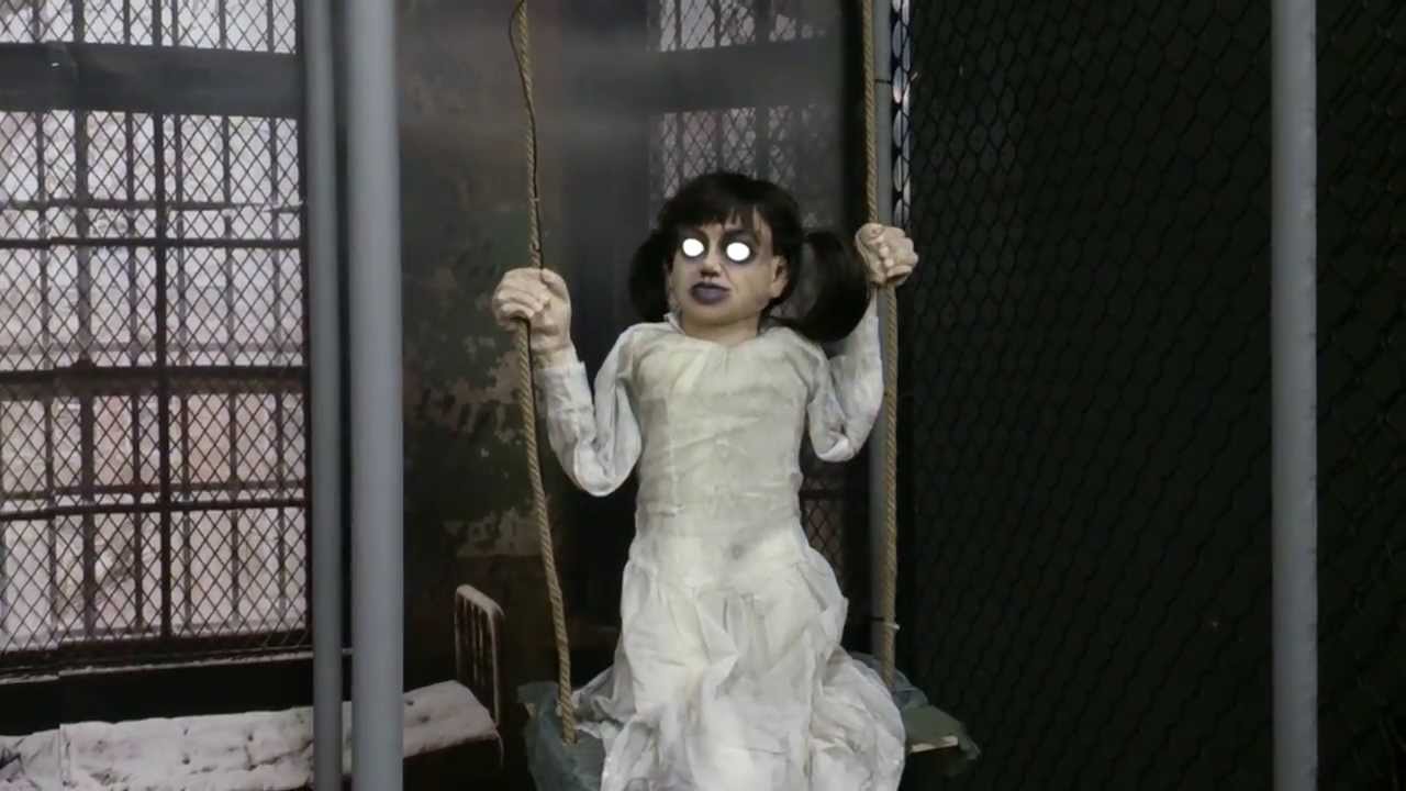 Spirit Halloween Lifesize swinging zombie girl YouTube