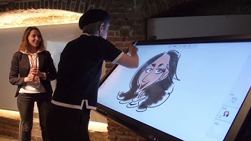 Evénementiel en entreprise : caricaturiste sur  écran interactif tactile SpeechiTouch Pro