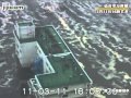 仙台市沿岸部を飲み込む津波＝自衛隊ヘリが震災発生直後に撮影