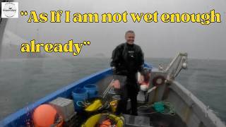 Scuba diving for scallops in a monsoon.