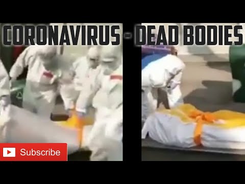 coronavirus---community-workers-transferring-the-dead-body-for-cremation.-wuhan-china