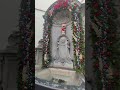 The famous Mannekin Pis in Brussels, Belgium dressed up for Christmas
