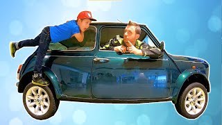 Ride on Mini Cooper with Papa Around the World at Children's Museum