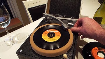 Decca record player playing a 45 RPM, 7" record.