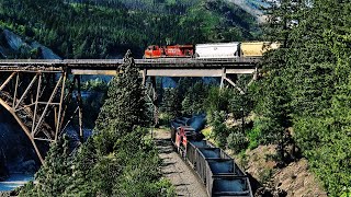 CPKC TRAINS MEET OVER CISCO BRIDGES IN THE FRASER CANYON  CANADA