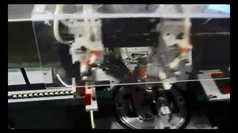 Automatic EE core Taping & testing machine WM-1948TSN.