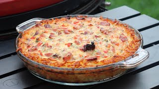 Ham and cheese quiche with hash brown crust.