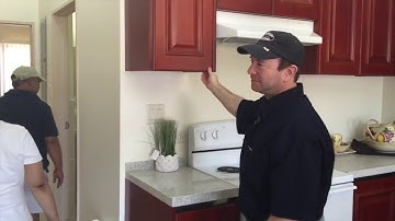 Tour of 1 bedroom at Summer Town Estates with GHURA officials