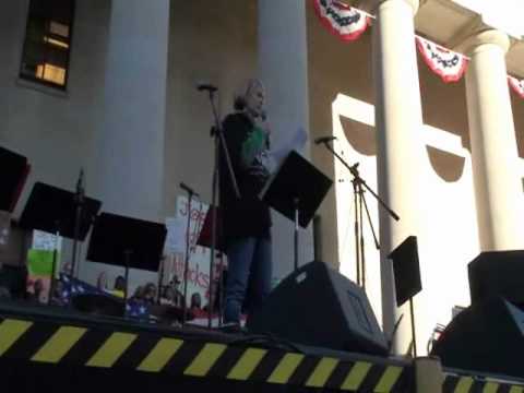 Fort Hayes Arts and Academic High School teacher Courtney Johnson speaks at the Statehouse