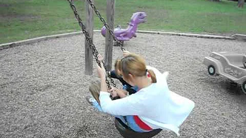 Angie on tire swing