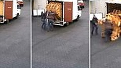 Workers Smash Crates Of Beer As They Unload From Van