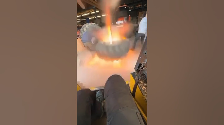 Tire explodes inside building!!🤯 #youtubeshorts