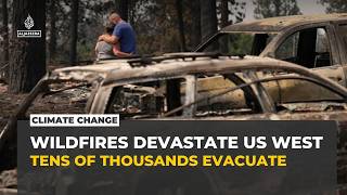 Western US wildfires force tens of thousands to evacuate