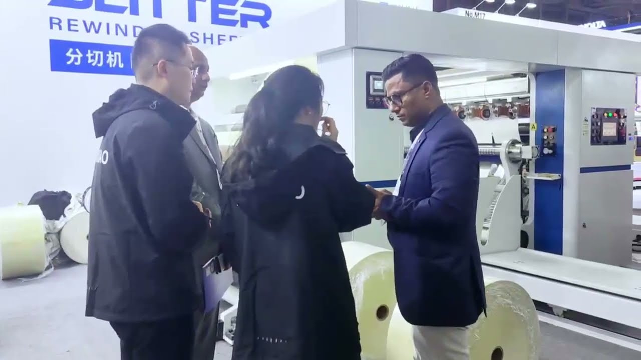 Binbao Machinery Team And Our New Design Slitter Rewinder Machine In Asian Label Expo 2023