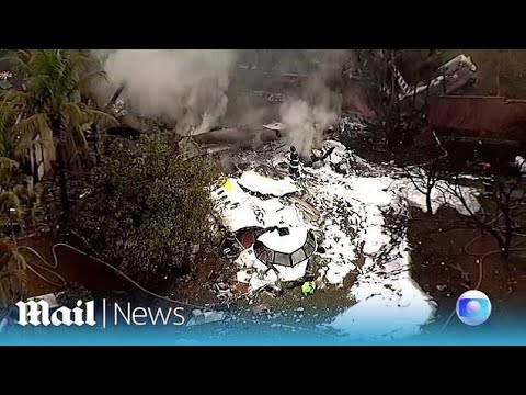 Brazil: Aerial view of the crash site of plane that fell into the ...