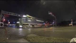 Idiot driver beats train with 4 geeps! (FEC 111)