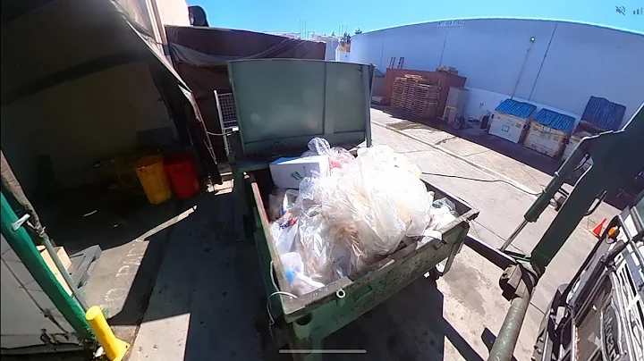 Waste Management commercial front load garbage truck 