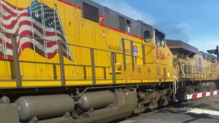 UP 7381 leads EB intermodal with mid train DPU duo