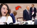 African president sits down before putin does