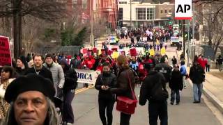 DC community members march in an annual parade commemorating civil rights leader Martin Luther King