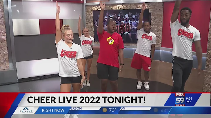 Eric dances with the crew from CHEER