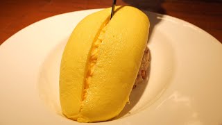 Japanese egg softboiled omelette rice (omurice) Japanese Street Food in Korea / Korean Street Food