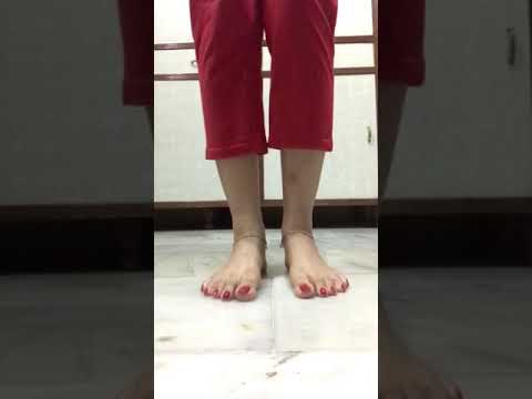 Desi barefoot in red