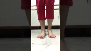 Desi barefoot in red