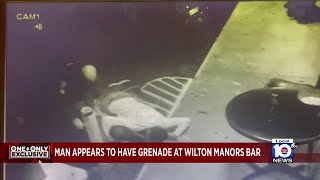 Man tackled after bringing grenade to bar