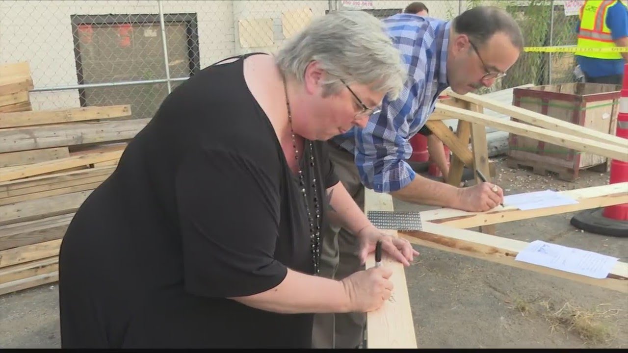 Phoenix Community Development Services tops off apartment building to ...