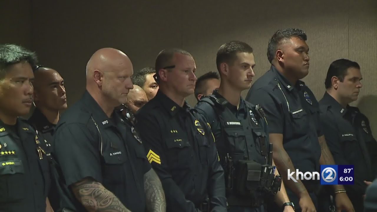 Courtroom packed as suspect in officer's death appears before judge
