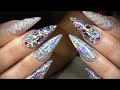Acrylic nails - super sparkly holo stilettos