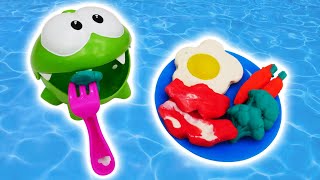 Pretend to play cooking Play-Doh food with Om Nom. Kitchen toys &amp; the toy pool. Om Nom videos.