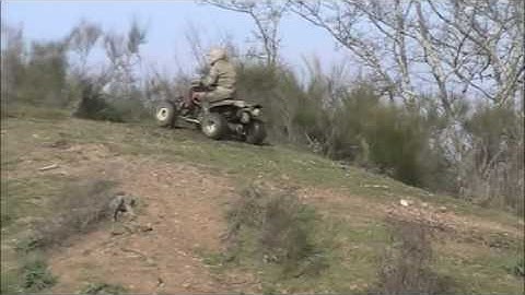 Polaris Predator 500 goes up and down through the hills