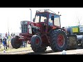 Different Case IH Tractor Puller tractors in front of the sledge doing some Tractor Pulling