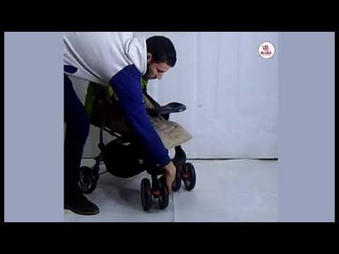 فيديو: كيفية طي عربة الأطفال Adamex