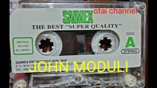 Tanak Ketua kampung   John Moduli